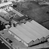 Was 1934 am Marktplatz von Mattighofen als Schlosserwerkstätte begann und 1938 erstmals zwecks Vergrößerung des Reparaturbetriebs und Verkaufs übersiedelte, bezog 1960 einen leerstehenden Vierkanter am heutigen Standort der KTM Fahrrad GmbH. Die 1967 angeschlossene, erste Shed-Halle der "Kraftfahrzeuge Trunkenpolz Mattighofen" existiert noch und wird als Lager genützt.